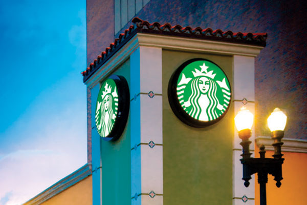 Starbucks logo, restaurant signage, illuminated logo